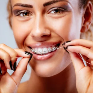 patient with ceramic braces in Bee Cave, TX